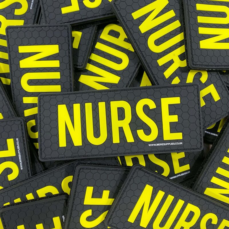 a picture of a patch that says Nurse in yellow letters on a black background