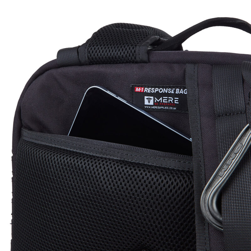 showing the mere response bag tag also showing there is a compartment for an ipad, tablet or laptop