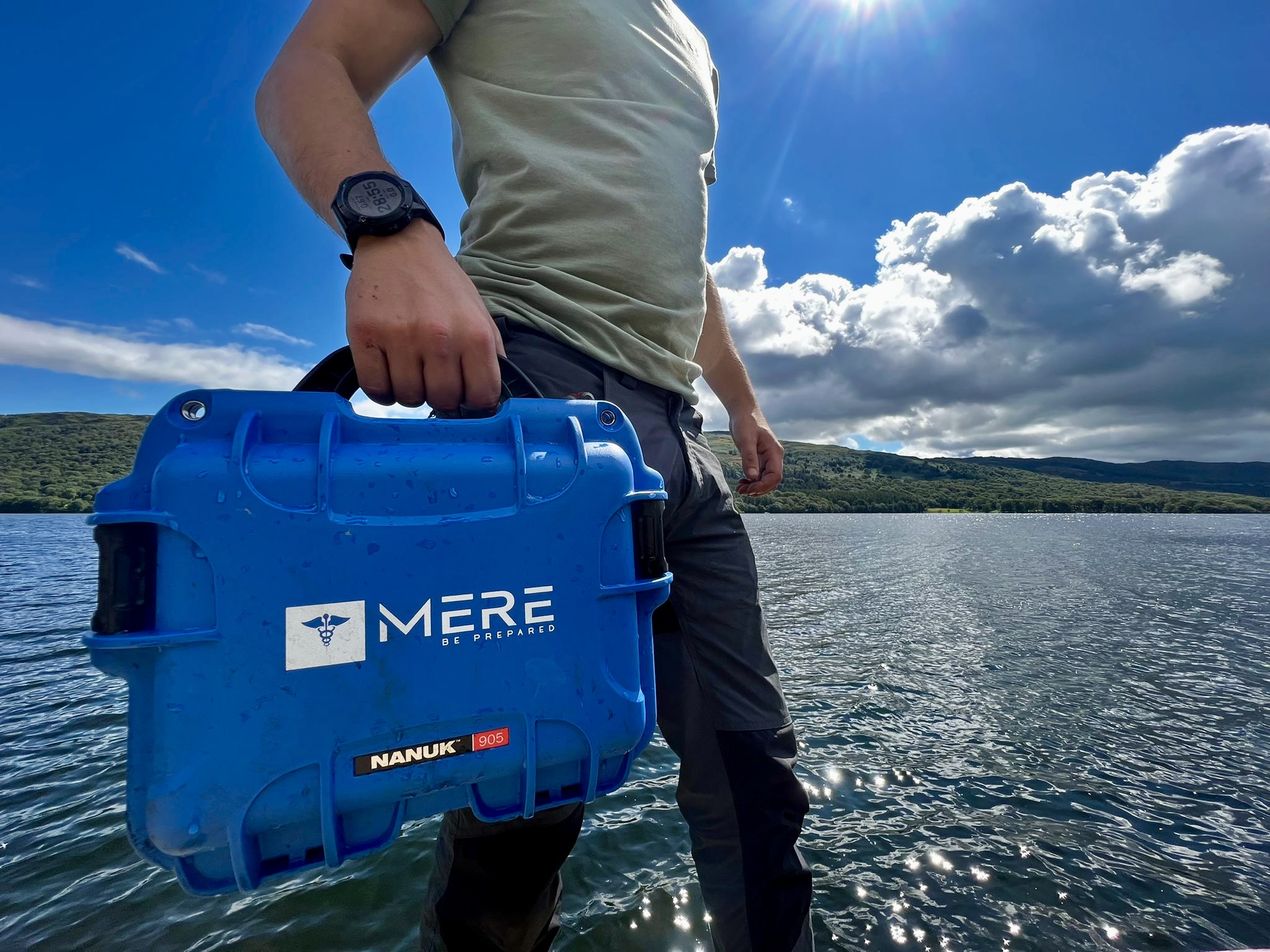 image showing a first aid kit near water